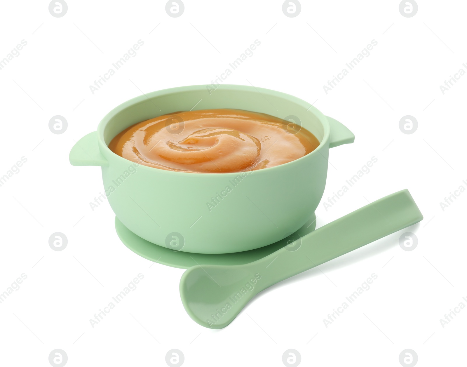 Photo of Bowl with tasty pureed baby food and spoon isolated on white