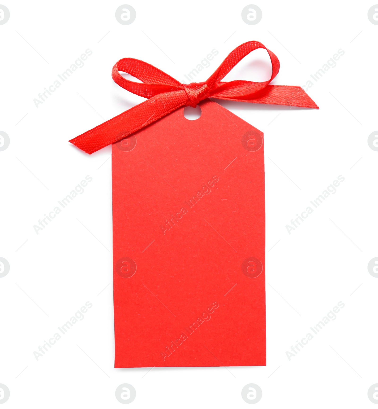 Photo of Blank red gift tag with satin ribbon on white background, top view