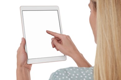 Woman using tablet with blank screen on white background, closeup. Mockup for design