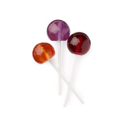 Photo of Tasty lollipops isolated on white, top view