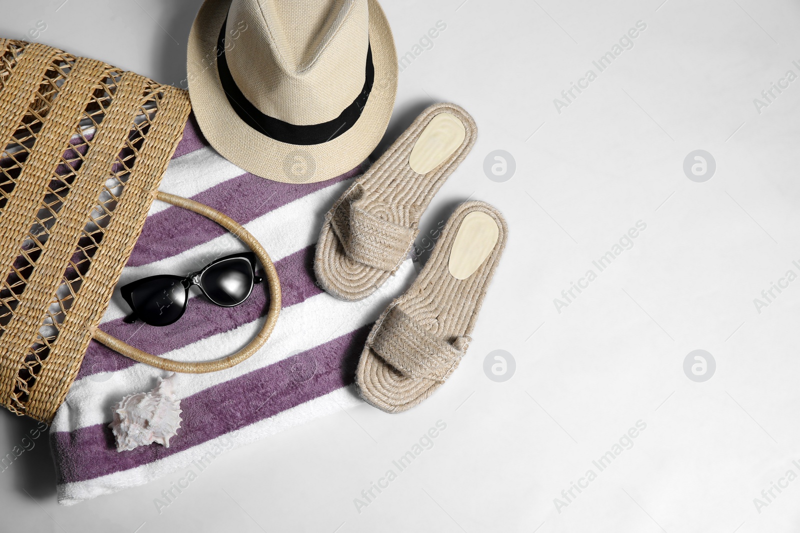Photo of Composition with stylish beach accessories on white background, top view