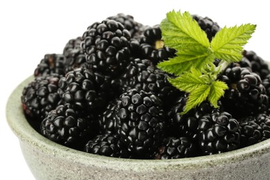 Photo of Bowl with fresh ripe blackberries isolated on white