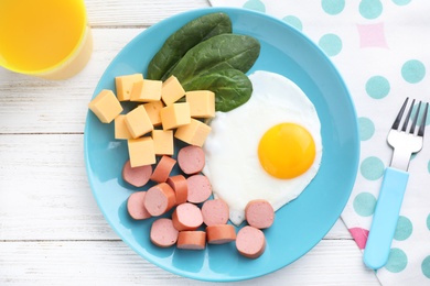 Photo of Flat lay composition with egg and cheese on white wooden table. Healthy breakfast