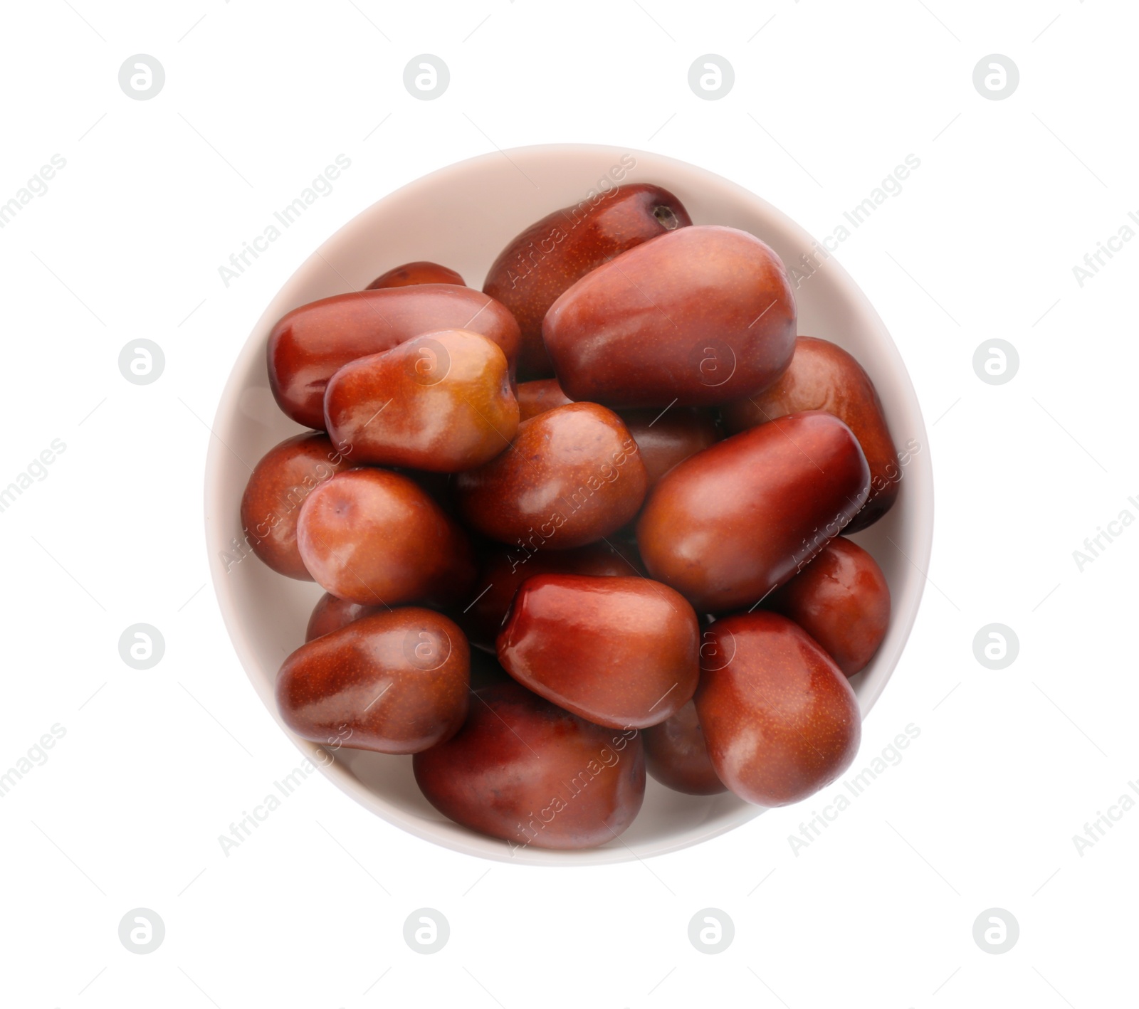 Photo of Fresh ripe oil palm fruits in bowl isolated on white, top view