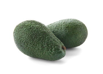 Ripe avocados on white background. Tropical fruit