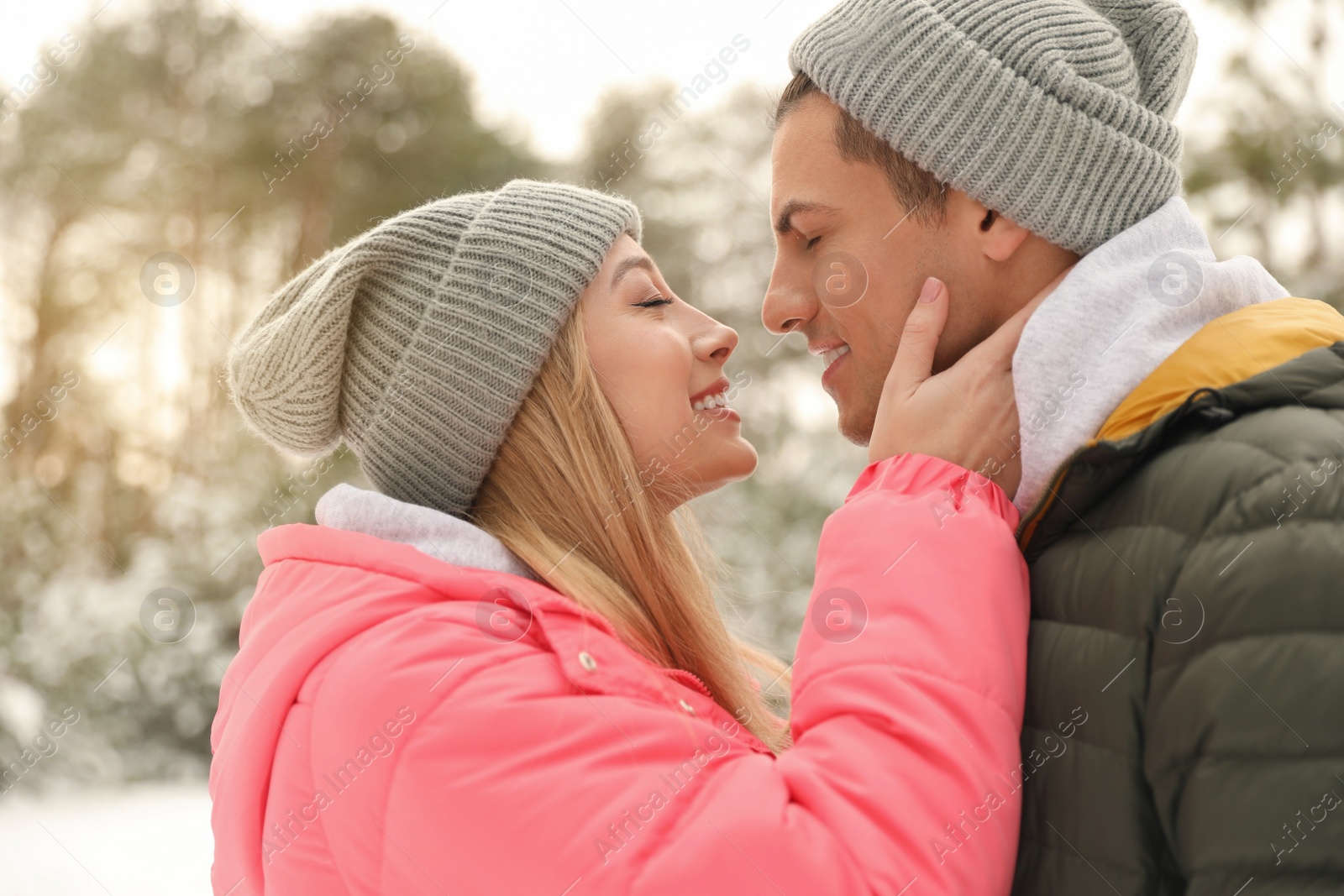 Photo of Beautiful happy couple outdoors on winter day