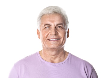 Photo of Mature man with healthy teeth on white background