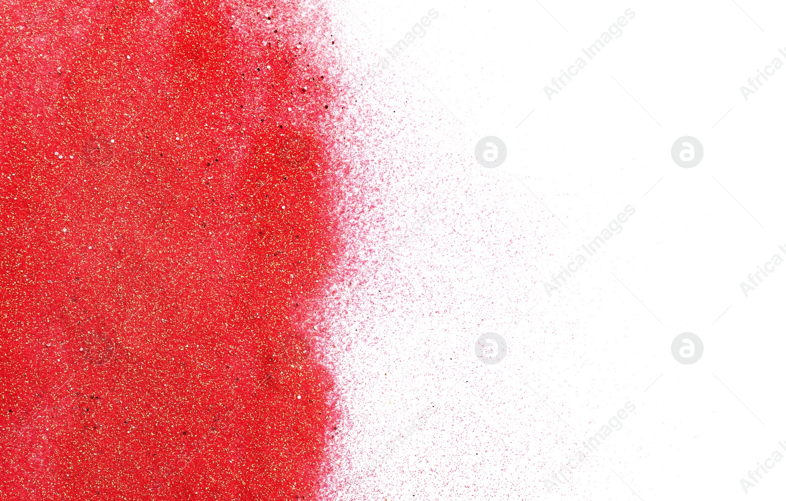 Photo of Red glitter on white background, top view