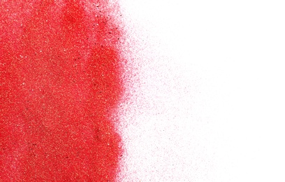 Photo of Red glitter on white background, top view