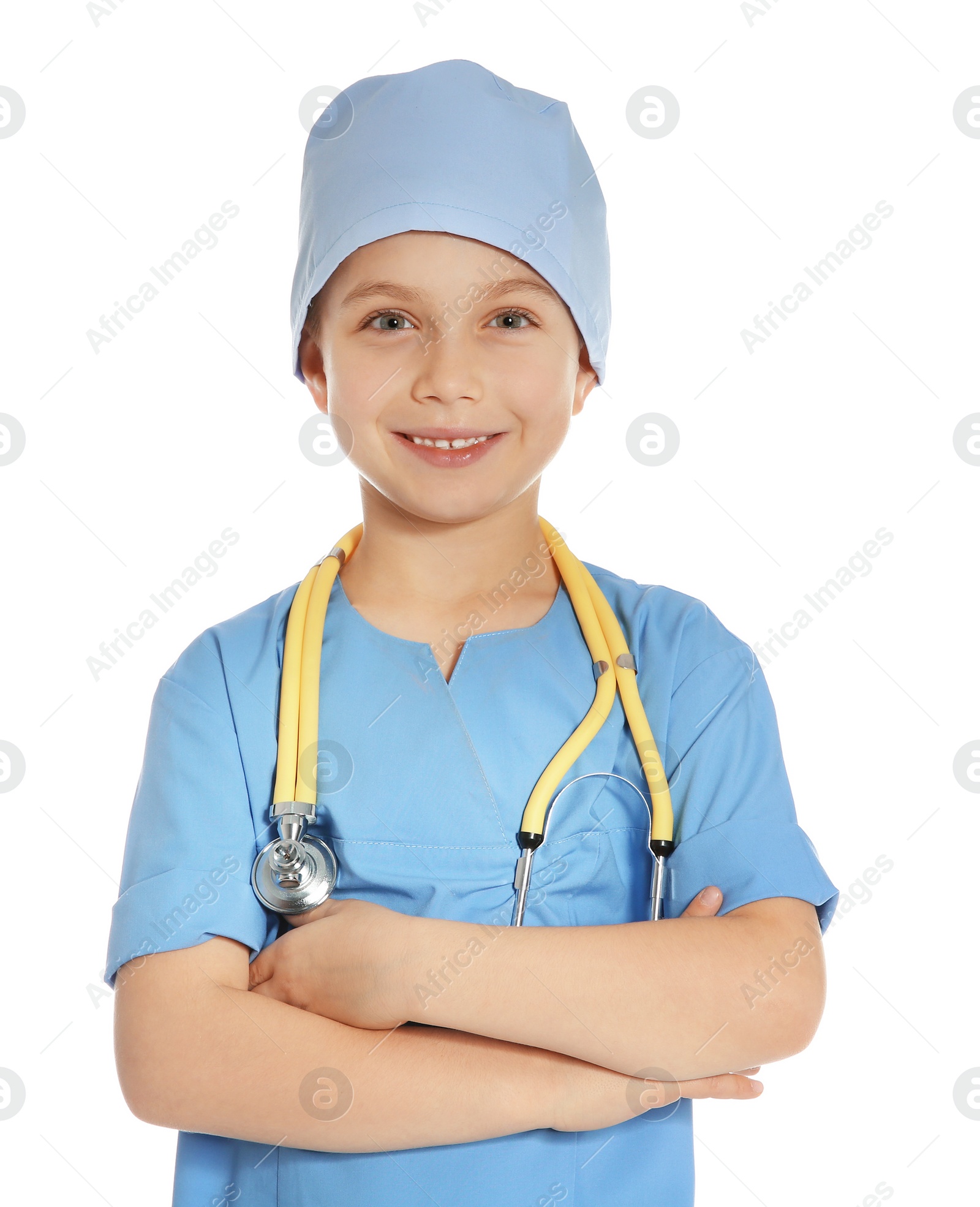 Photo of Cute little child in doctor uniform with stethoscope on white background