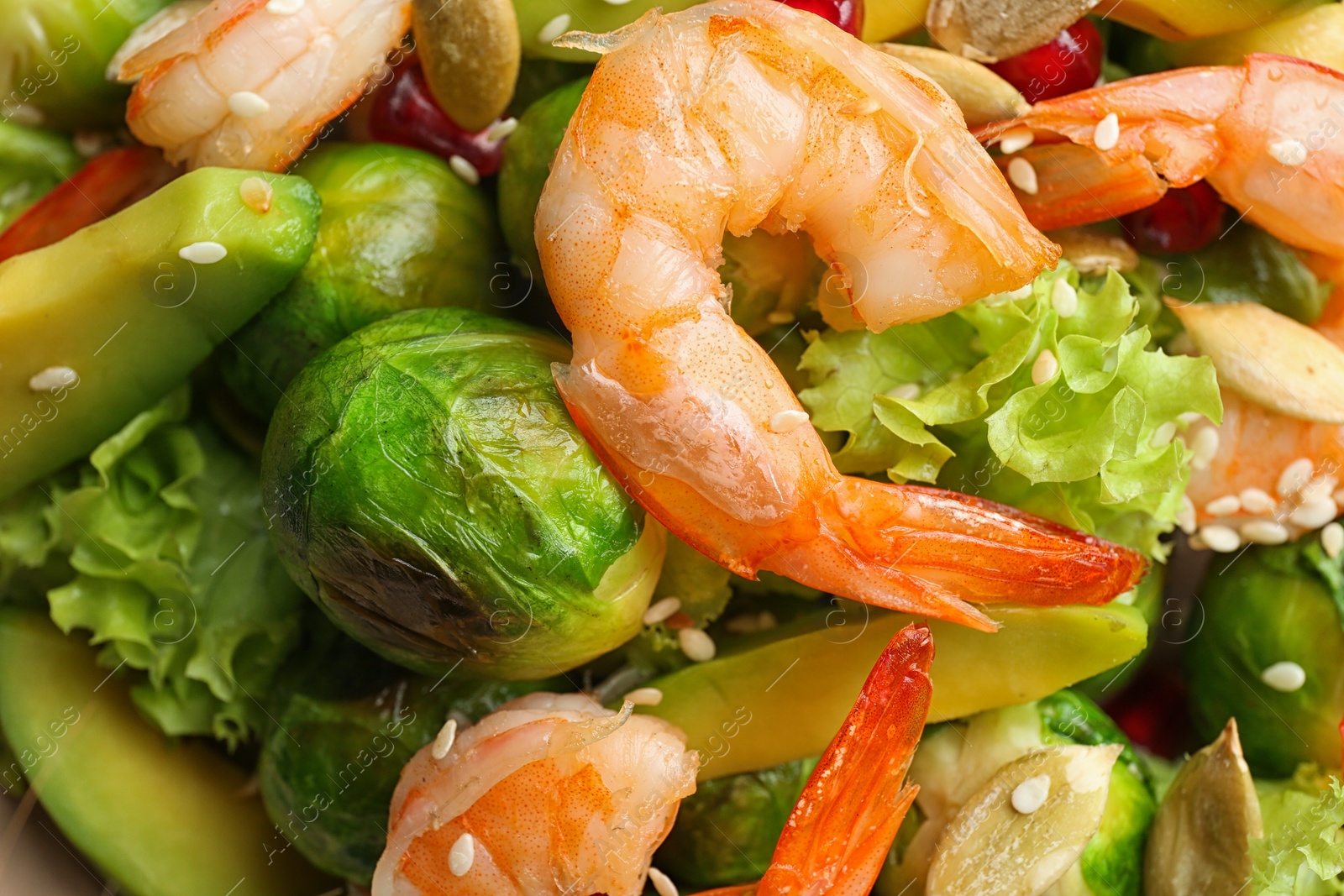 Photo of Tasty salad with Brussels sprouts, closeup view