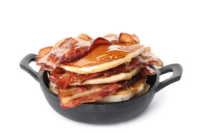 Photo of Delicious pancakes with maple syrup and fried bacon in frying pan on white background