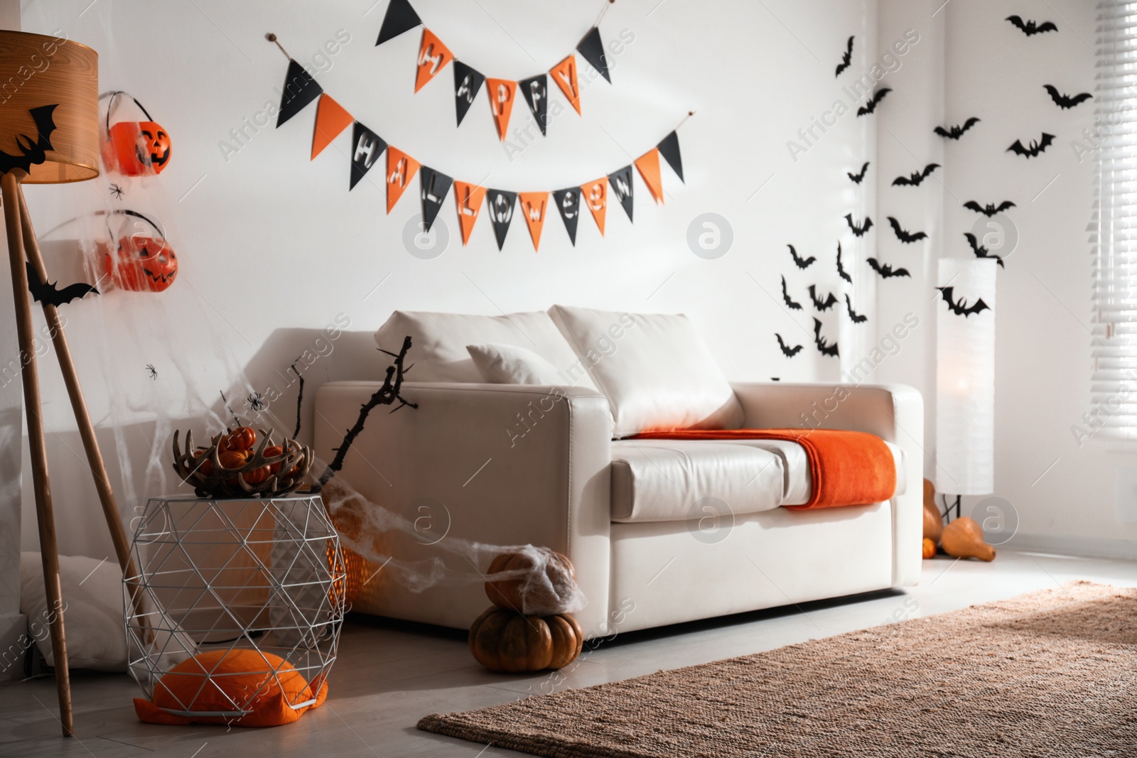 Photo of Modern room decorated for Halloween. Festive interior