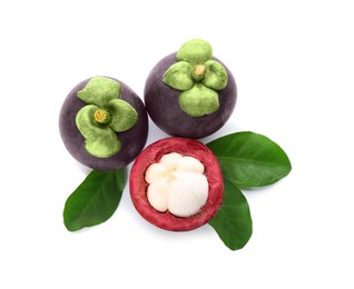 Fresh mangosteen fruits with green leaves on white background, top view