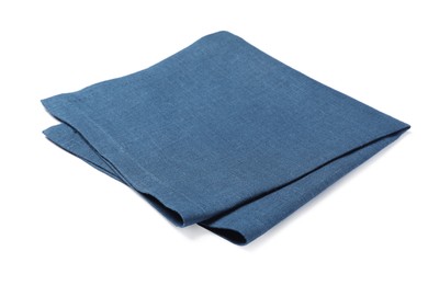 Photo of Blue folded fabric napkin on white background