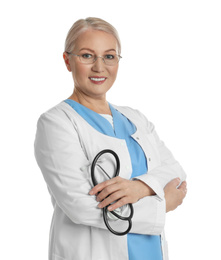 Mature doctor with stethoscope on white background