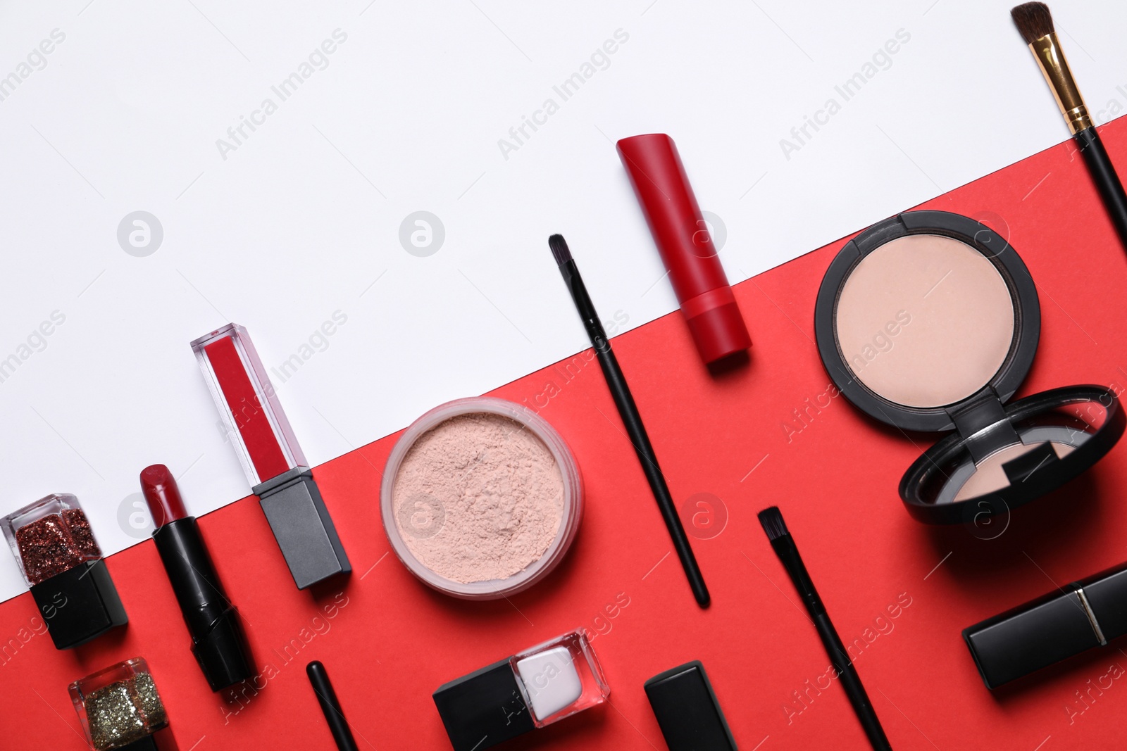 Photo of Flat lay composition with different makeup products on color background