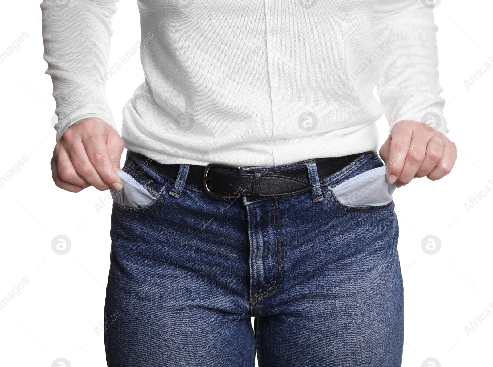 Photo of Poor woman showing empty pockets on white background, closeup