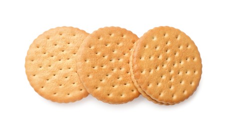 Photo of Tasty sandwich cookies isolated on white, top view