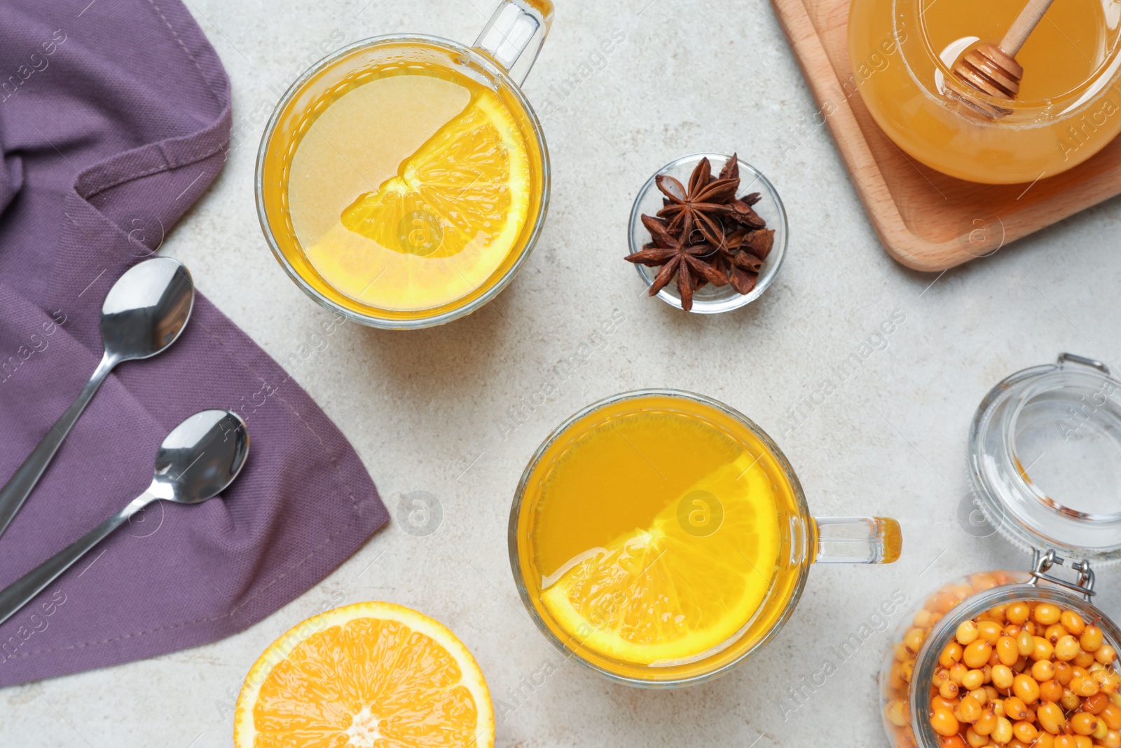 Photo of Flat lay composition with immunity boosting drink on grey table