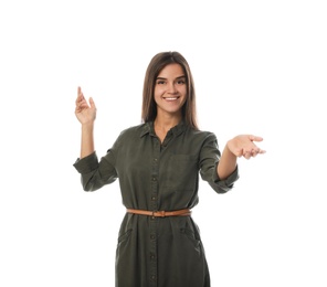 Young woman in casual clothes talking on white background