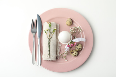 Festive Easter table setting with beautiful floral decor, top view