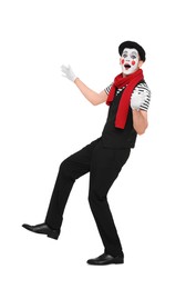 Photo of Funny mime artist making shocked face on white background