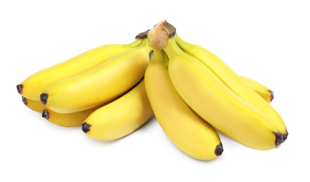 Photo of Clusters of ripe baby bananas on white background