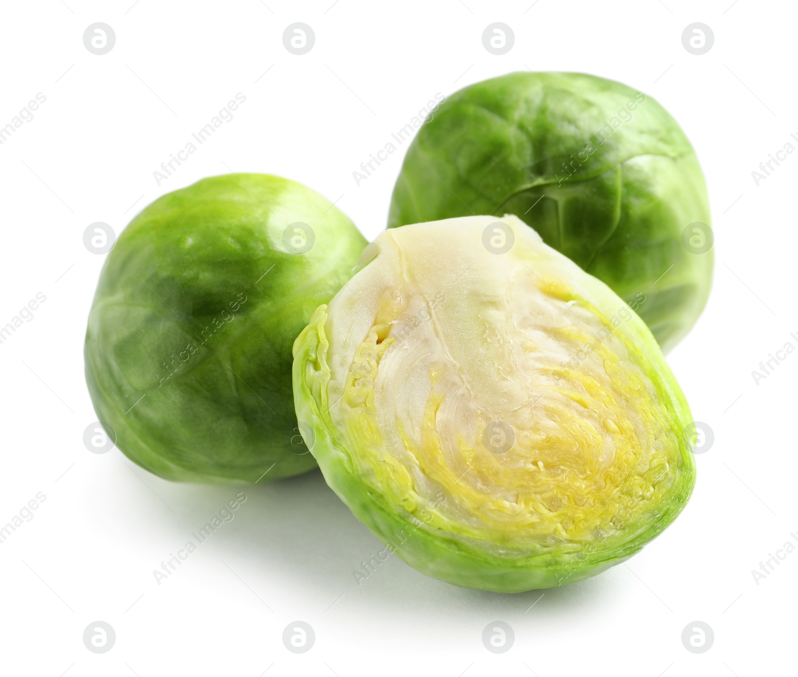 Photo of Fresh tasty Brussels sprouts on white background