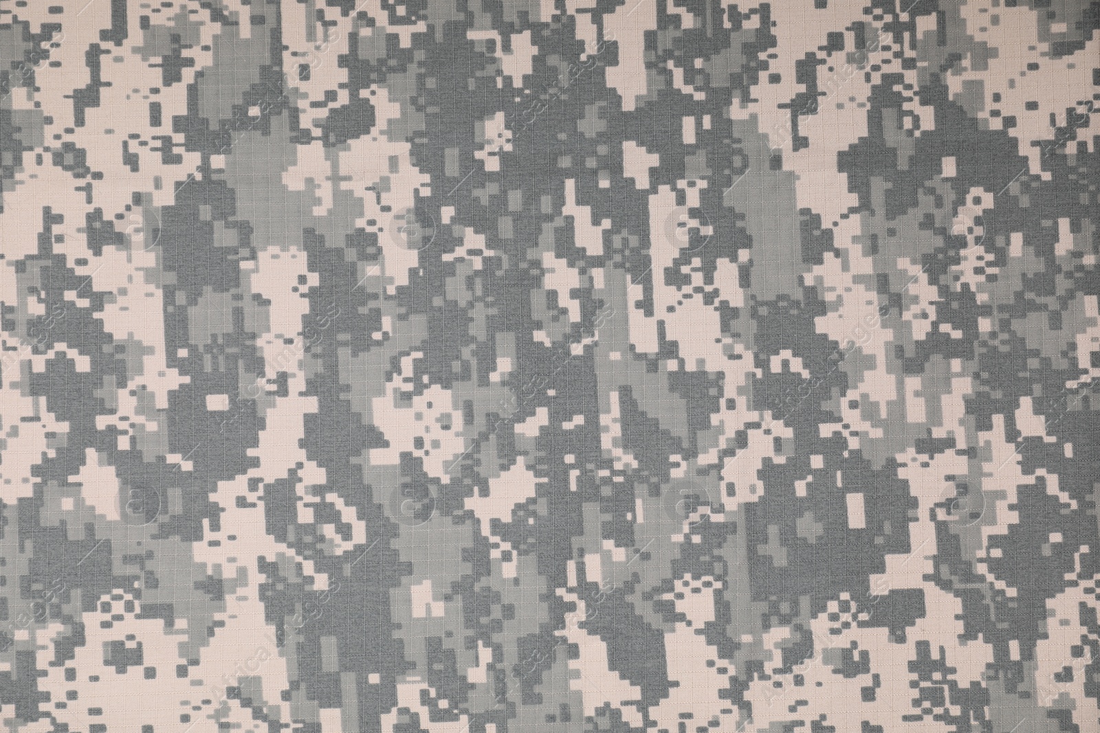 Photo of Texture of camouflage fabric as background, top view