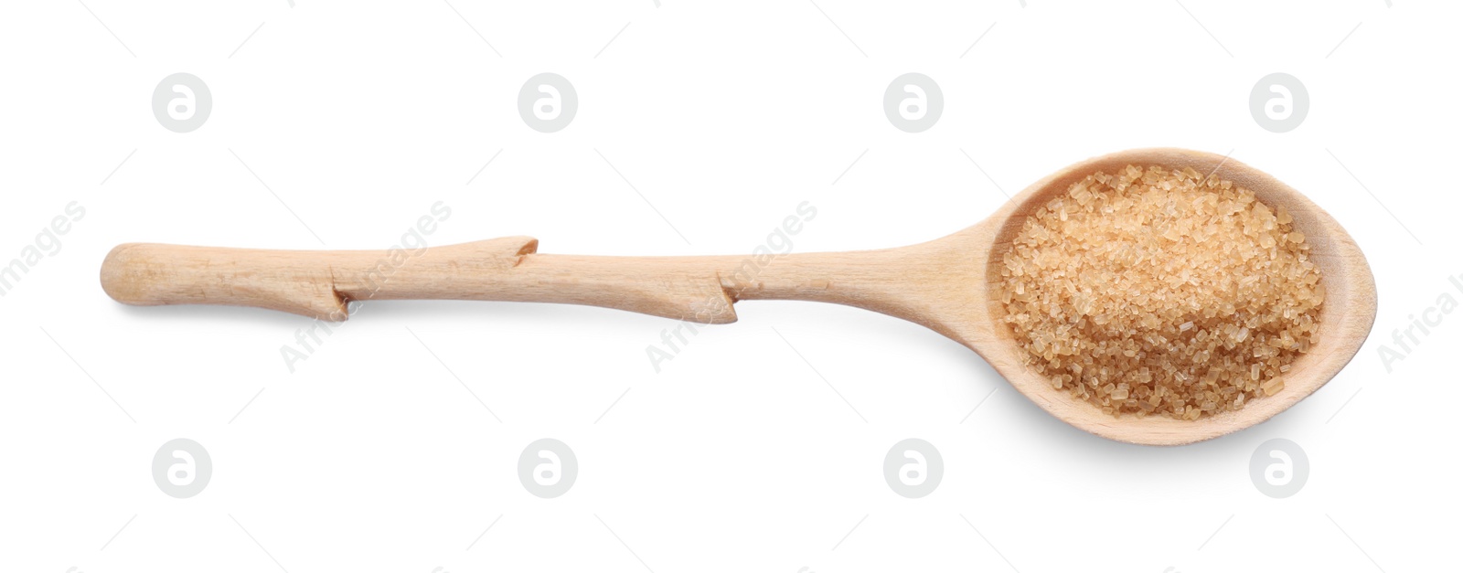 Photo of Brown sugar in wooden spoon isolated on white, top view