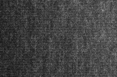 Photo of Texture of soft grey fabric as background, closeup