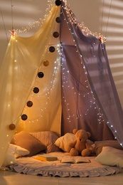 Modern children's room interior with play tent