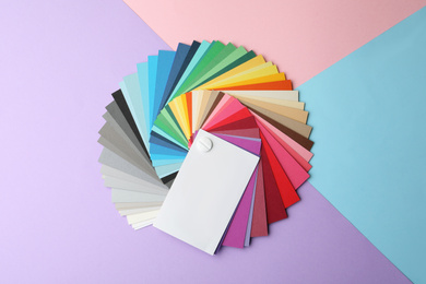 Photo of Color palette on bright background, top view