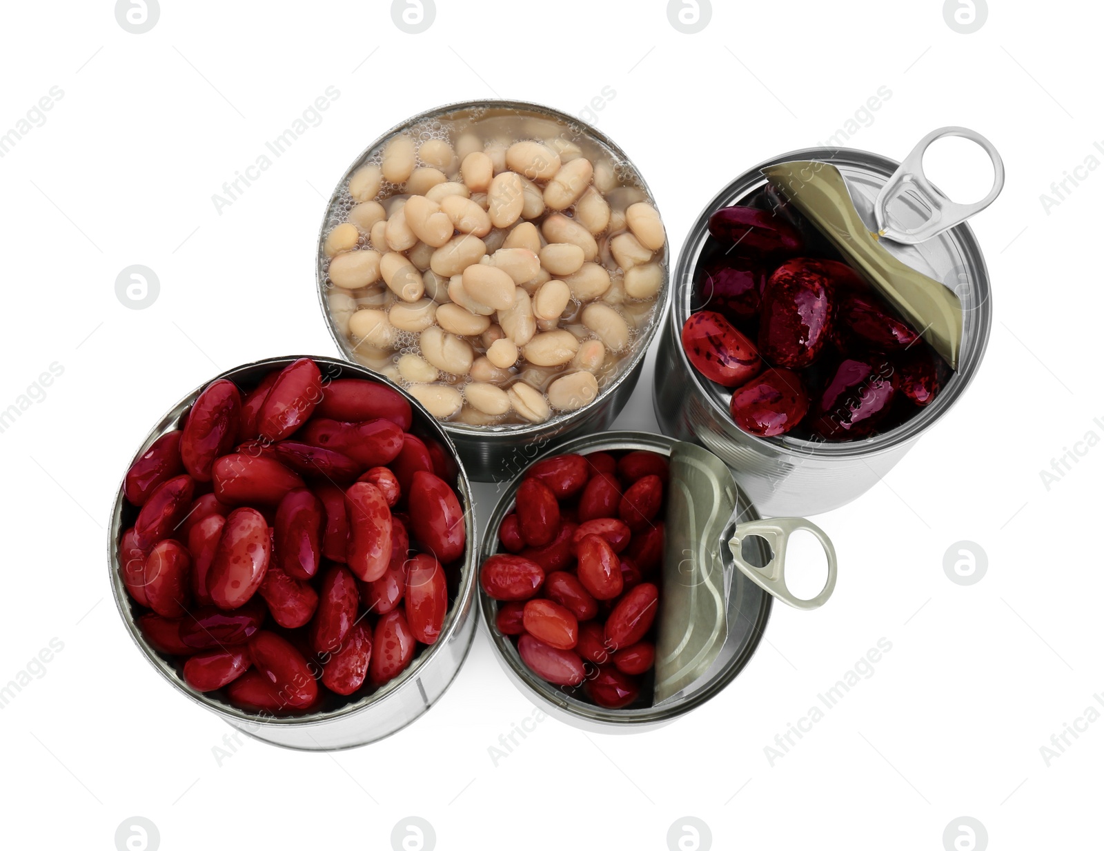Photo of Tin cans with different kidney beans on white background, top view