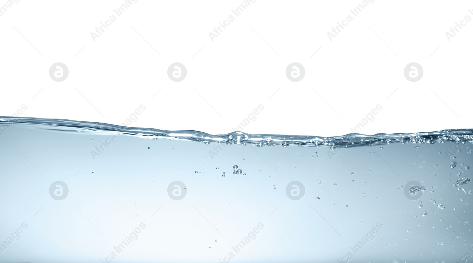 Photo of Bubbles in clear water on grey background