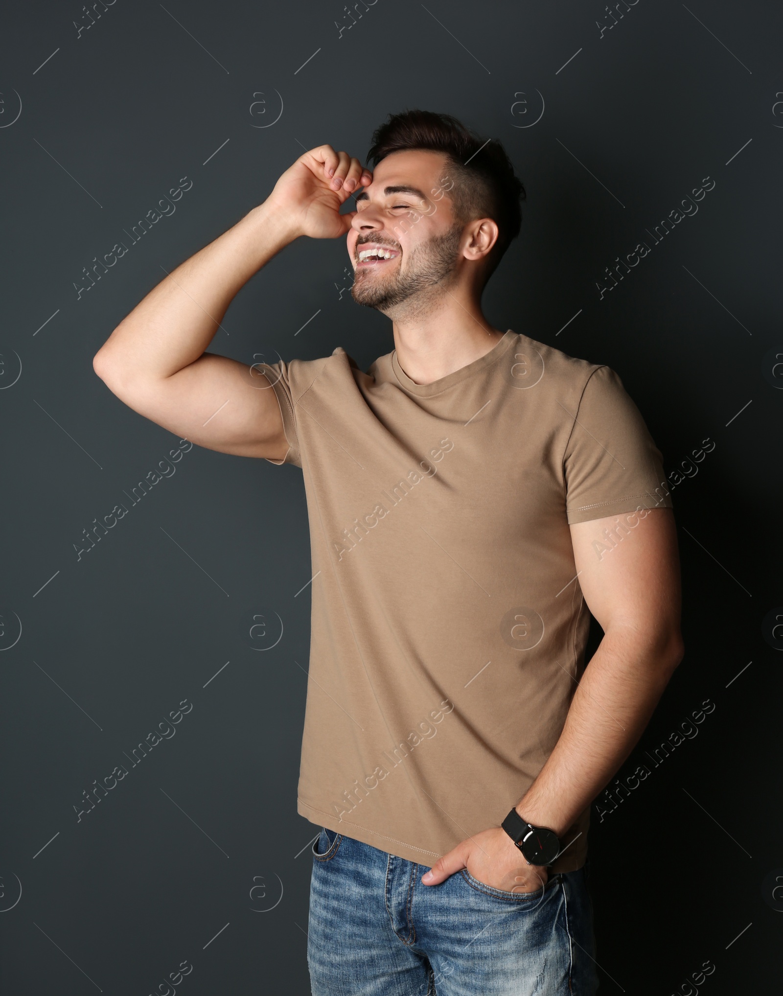 Photo of Portrait of handsome man on dark background