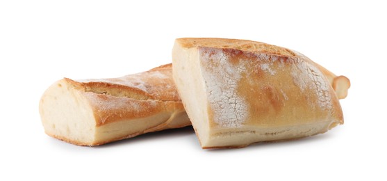 Photo of Pieces of fresh baguette on white background