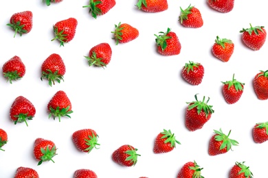 Composition with ripe red strawberries on light background