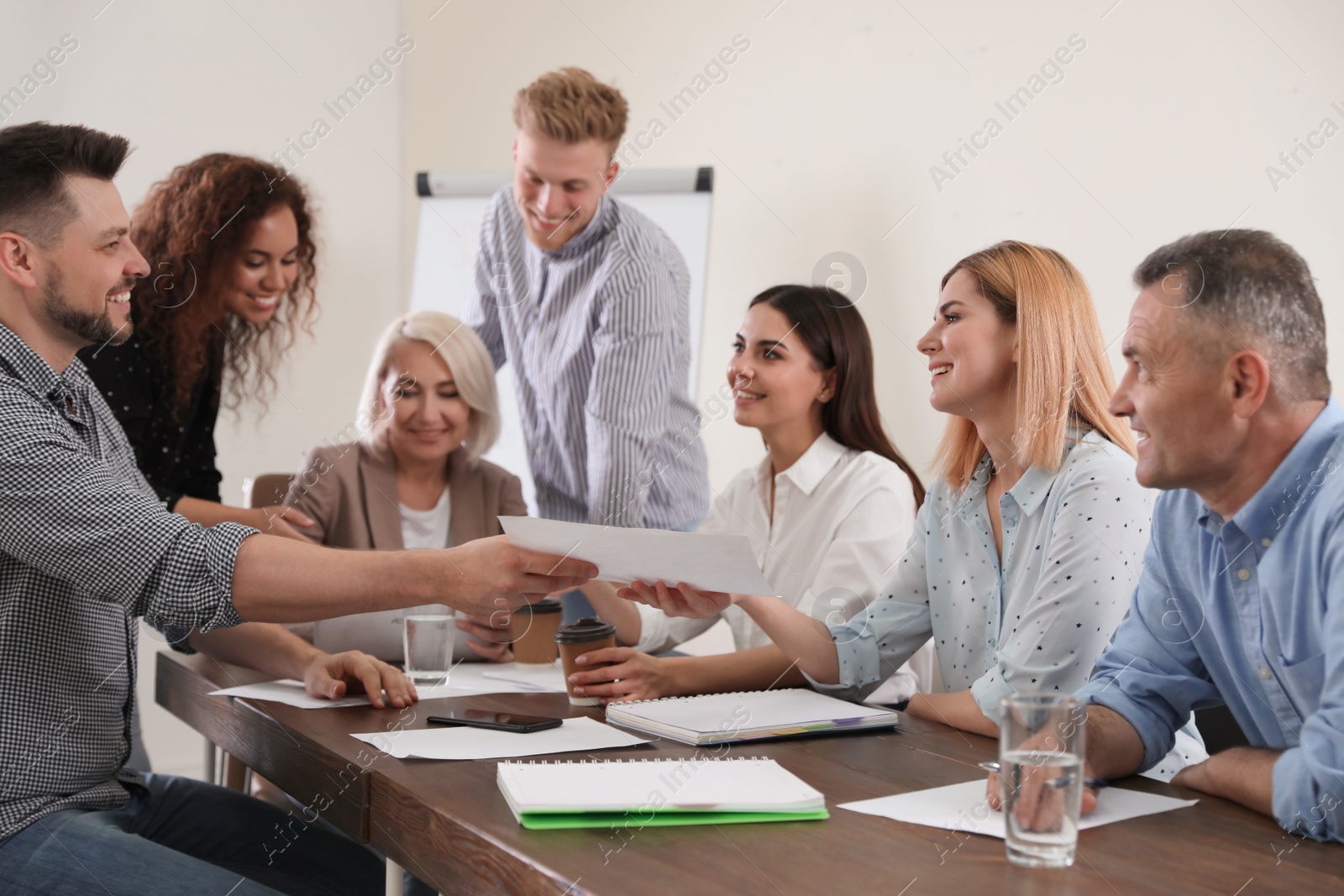 Photo of Portrait of volunteers having meeting in office