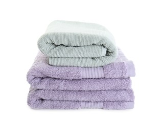 Stack of different folded terry towels isolated on white