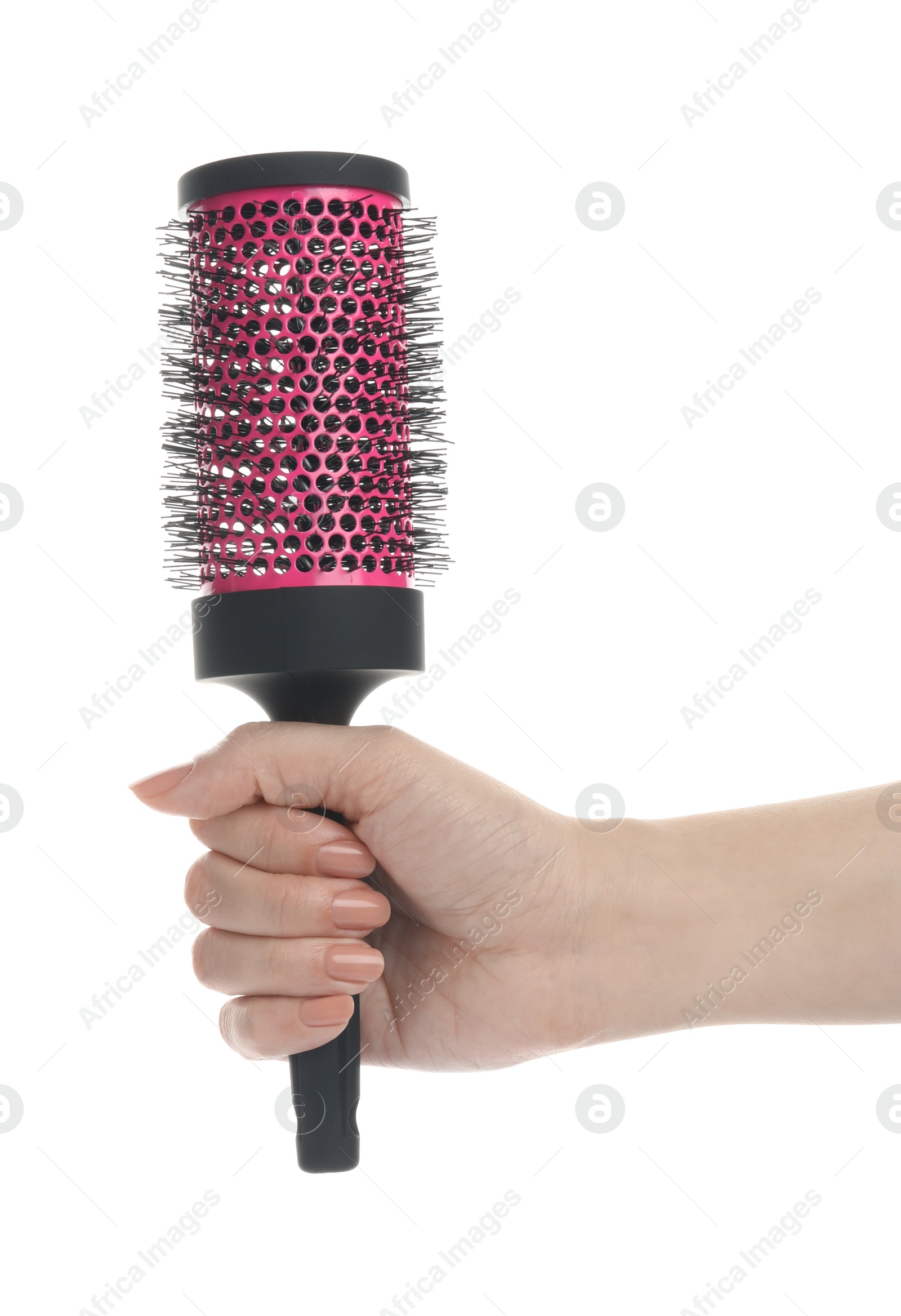 Photo of Woman holding round hair brush on white background, closeup