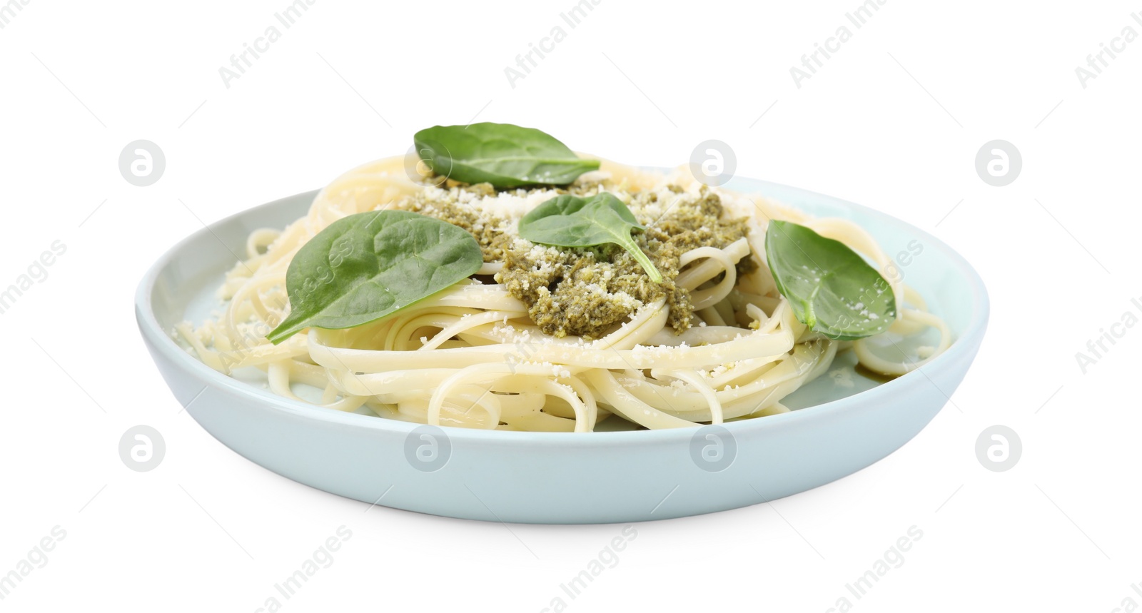 Photo of Tasty pasta with spinach, cheese and sauce isolated on white