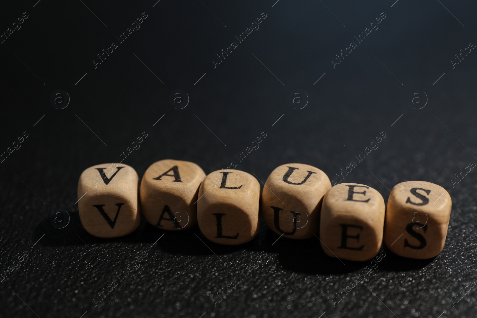Photo of Beads with word VALUES on black background