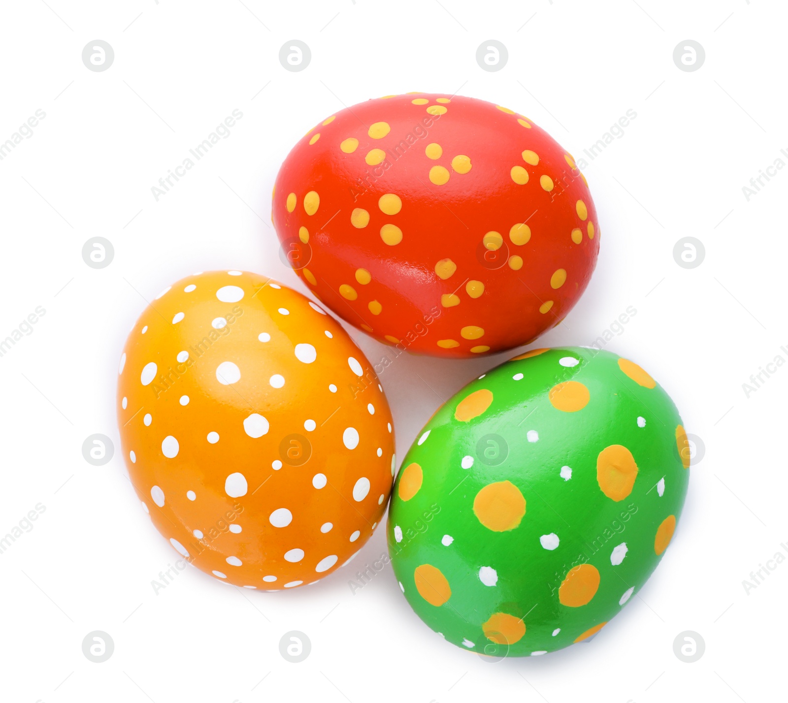 Photo of Decorated Easter eggs on white background, top view. Festive tradition