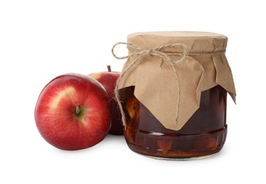 Tasty apple jam in glass jar and fresh fruits on white background