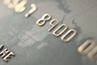 Photo of Plastic credit card as background, macro view