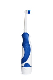 Photo of Electric toothbrush on white background. Dental care