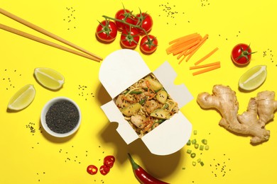 Photo of Flat lay composition with noodle wok and ingredients on yellow background