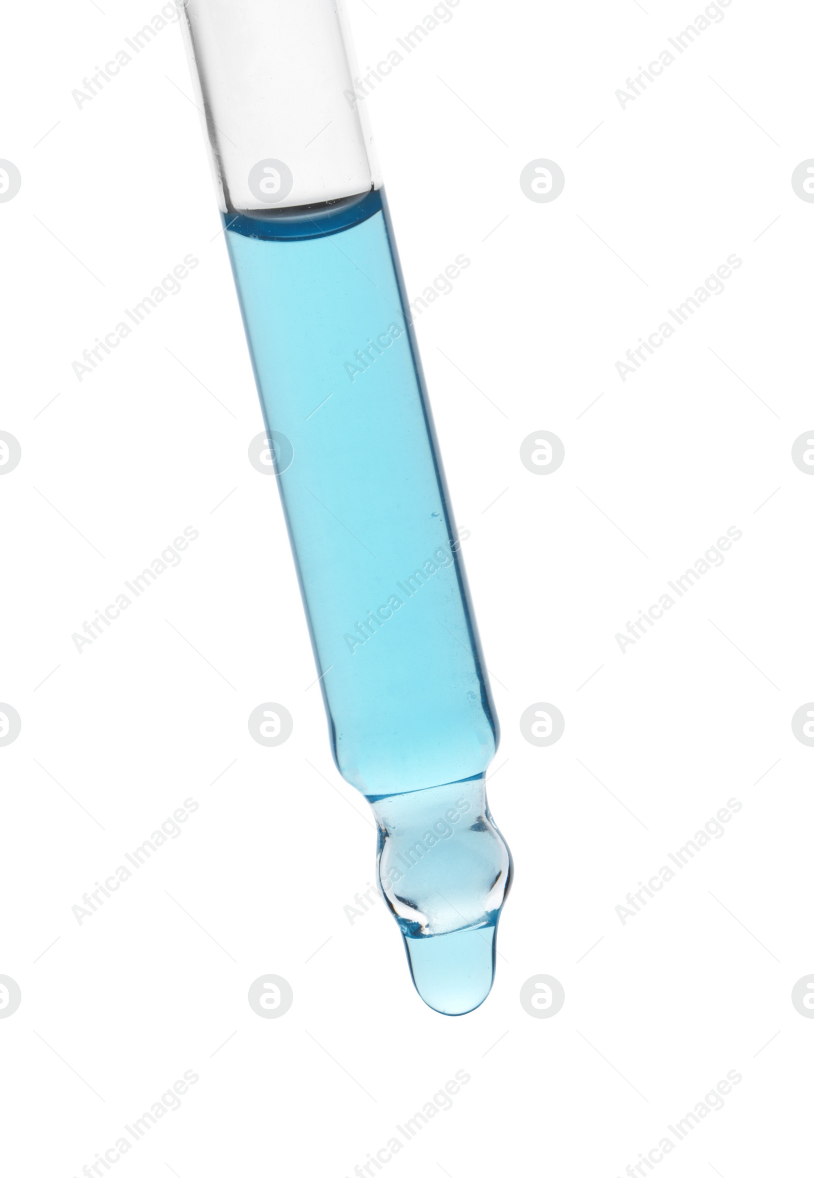 Photo of Dripping light blue facial serum from pipette on white background, closeup